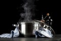 Steaming pot on black background Royalty Free Stock Photo