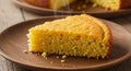 Steaming Slice of Golden Cornbread on Rustic Plate Royalty Free Stock Photo