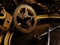 Steampank background. Old dirty gear wheel of a disassembled vintage watch