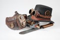 Steampunk accessories - hat, goggles, gun, mask and knife Royalty Free Stock Photo