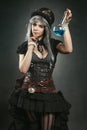 Steampunk alchemist woman with potion