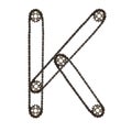 Steampunk font. Letter K from chain gear elements, tires, reflectors