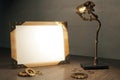 Steampunk background with blank picture frame and lamp Royalty Free Stock Photo