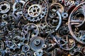 Steampunk background, machine parts, large gears and chains from machines and tractors.