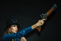 Steampunk girl armed and dangerous. Royalty Free Stock Photo