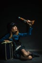 Steampunk girl armed and dangerous. Royalty Free Stock Photo