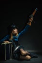 Steampunk girl armed and dangerous. Royalty Free Stock Photo