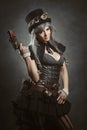 Steampunk girl with firearm Royalty Free Stock Photo