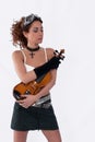 Steampunk girl with goggles and violin eyes closed