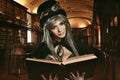Steampunk girl in the royal library Royalty Free Stock Photo
