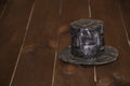 Steampunk hat on a wooden table