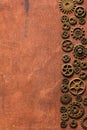 Steampunk mechanical cogs gears wheels on wooden background Royalty Free Stock Photo