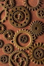 Steampunk mechanical cogs gears wheels on wooden background Royalty Free Stock Photo