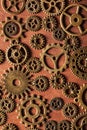 Steampunk mechanical cogs gears wheels on wooden background