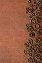 Steampunk mechanical cogs gears wheels on wooden background