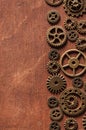 Steampunk mechanical cogs gears wheels on wooden background Royalty Free Stock Photo