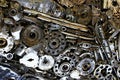 Steampunk texture of various engine and machinery parts such as cogwheels, flanges, axles and crankshafts welded together