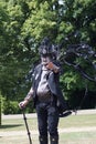 Steampunk Weekend character in black during a parade at Belvoir Castle in Lincolnshire England