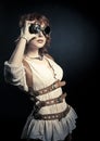 Steampunk woman looking over her goggles Royalty Free Stock Photo