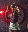 Steampunk woman with mechanical gun Royalty Free Stock Photo