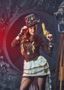 Steampunk woman with mechanical gun Royalty Free Stock Photo