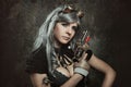 Steampunk woman with mechanical gun Royalty Free Stock Photo