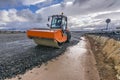 A steamroller on a road construction site Royalty Free Stock Photo