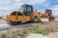 A steamroller at a road construction site Royalty Free Stock Photo