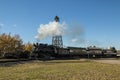 Steamtrain and a Wooden Drilling Rig Royalty Free Stock Photo