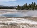 Steamy blue geyser at Yellowstone National Park Royalty Free Stock Photo