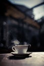 Steamy coffee cup in the sunlight Royalty Free Stock Photo