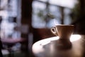Steamy coffee cup in the sunlight Royalty Free Stock Photo