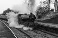 Stean train now leaving Llangollen Station in monochrome Royalty Free Stock Photo