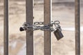Steel bar gate with strong chain and padlock