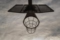 Steel basketball backboard with the hoop metal ring and steel chain net against sky background Royalty Free Stock Photo