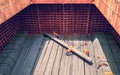 steel billets stacked to loading from a ship in port - the raw material for the manufacture of parts. Royalty Free Stock Photo