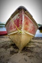 Steel boat beached on the lakeshore at Pelican Pouch Lake, Ontario, Canada