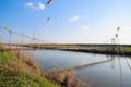 Steel bridge and gas pipeline through irrigation canal Royalty Free Stock Photo