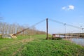 Steel bridge and gas pipeline through irrigation canal Royalty Free Stock Photo