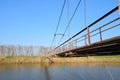 Steel bridge and gas pipeline through irrigation canal Royalty Free Stock Photo