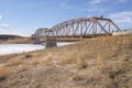 Steel Bridge over a Frozen Prairie River