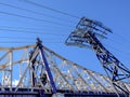 Roosevelt bridge alongside an electric pylon