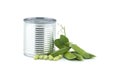 Steel can and fresh garden peas isolated on white Royalty Free Stock Photo