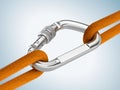 Steel carabiner hook with a climbing rope. Reliability, support concept Royalty Free Stock Photo