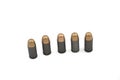 Steel cased, copper jecketed handgun bullets on a white background Royalty Free Stock Photo