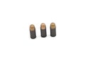 Steel cased, copper jecketed handgun bullets on a white background Royalty Free Stock Photo