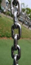 Steel chrome plated chain in detail used in playground in Delft, the Netherlands