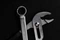 Wrench and pliers on black background Royalty Free Stock Photo