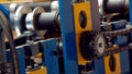 Steel cog gear set of metal sheet bending machine in metalwork factory Royalty Free Stock Photo