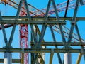 Steel construction frame of office building with tower cranes Royalty Free Stock Photo